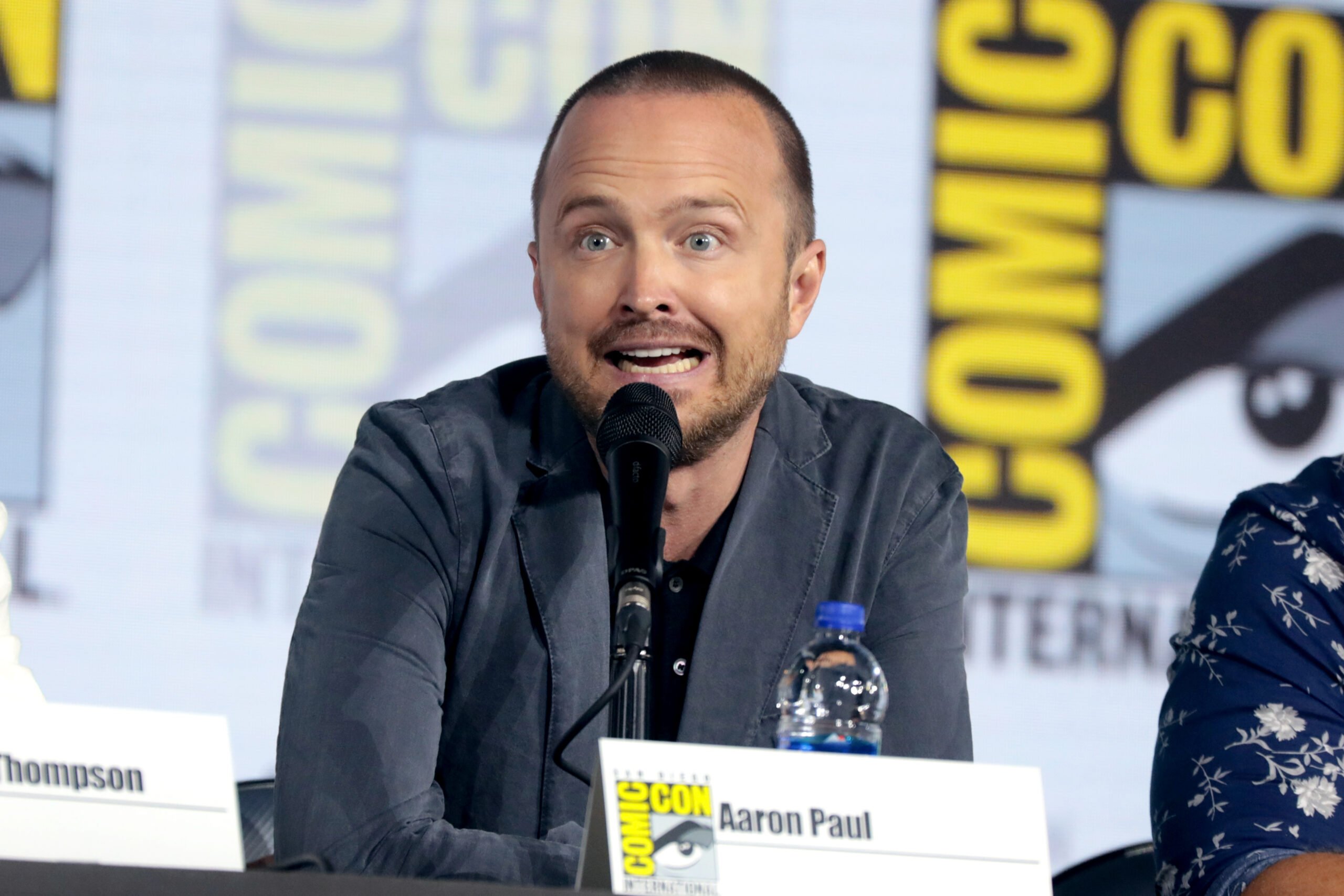 Aaron Paul playing a hand at a poker tournament