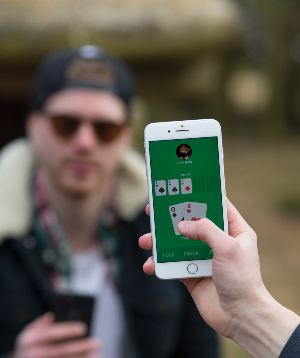 Friends playing face to face poker on the EasyPoker app