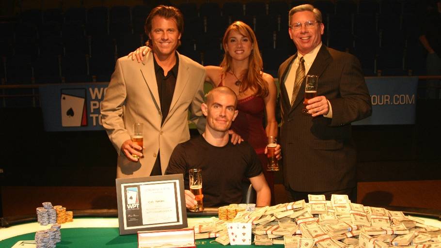 Gus Hansen collecting his third World Poker Tour title