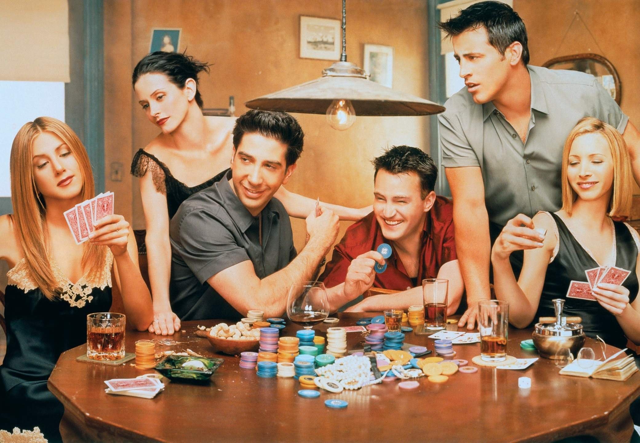 Friends around a table at a home poker night