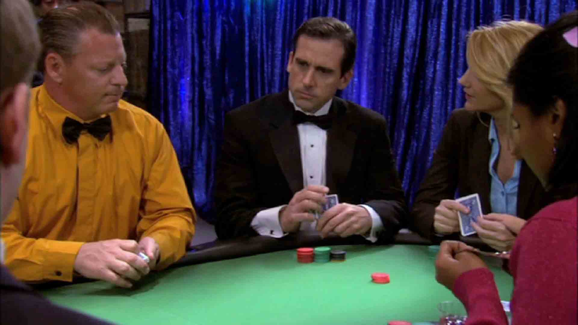 A poker player wincing after limping into a pot with a weak hand